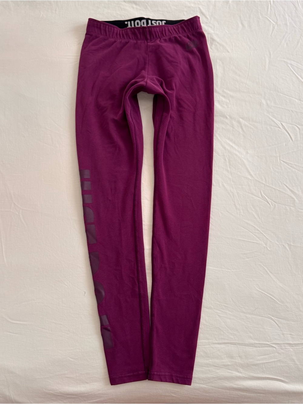 2000s Nike magneta activewear leggings with logo on side. Size S